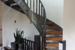 curved stair with wood treads