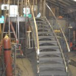 Curved Staircase with Metal Grating Treads During Fabrication