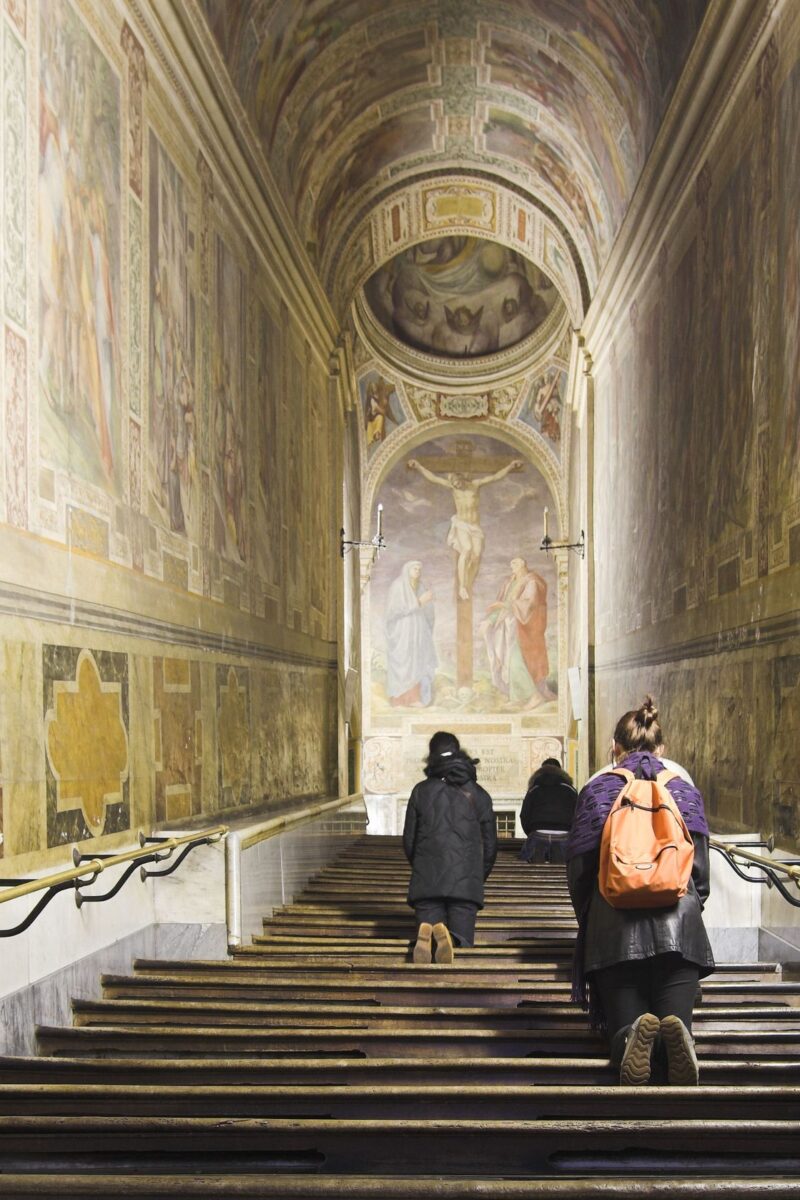 People Kneeling on the Holy Stairs