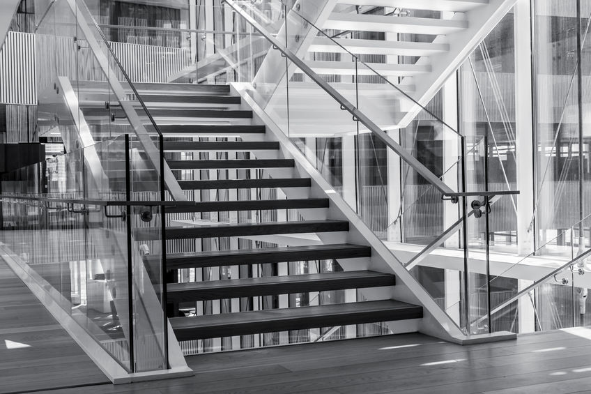 Indoors stairs in a modern architecture building. Black and white high contrast picture